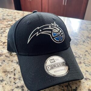 Orlando Magic baseball cap.